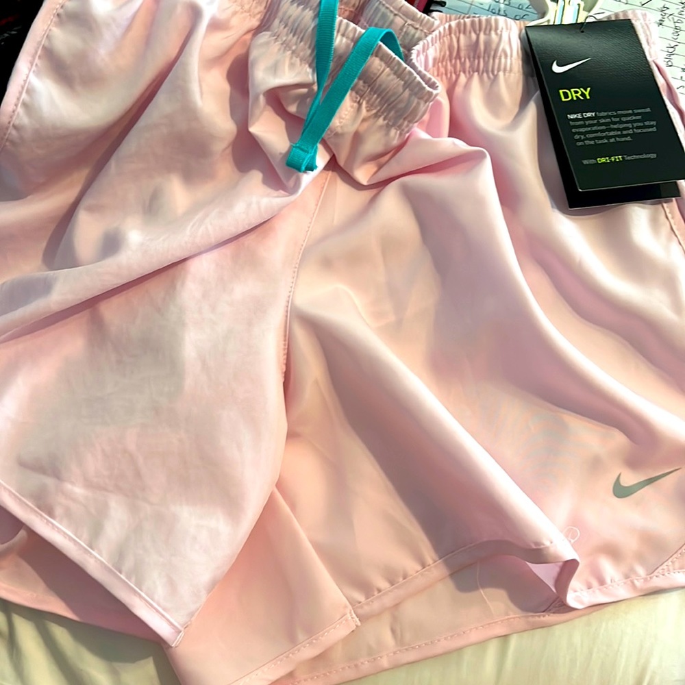 Pink Nike shorts